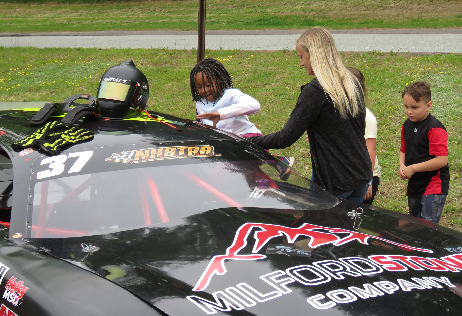 Memorial students and race cars