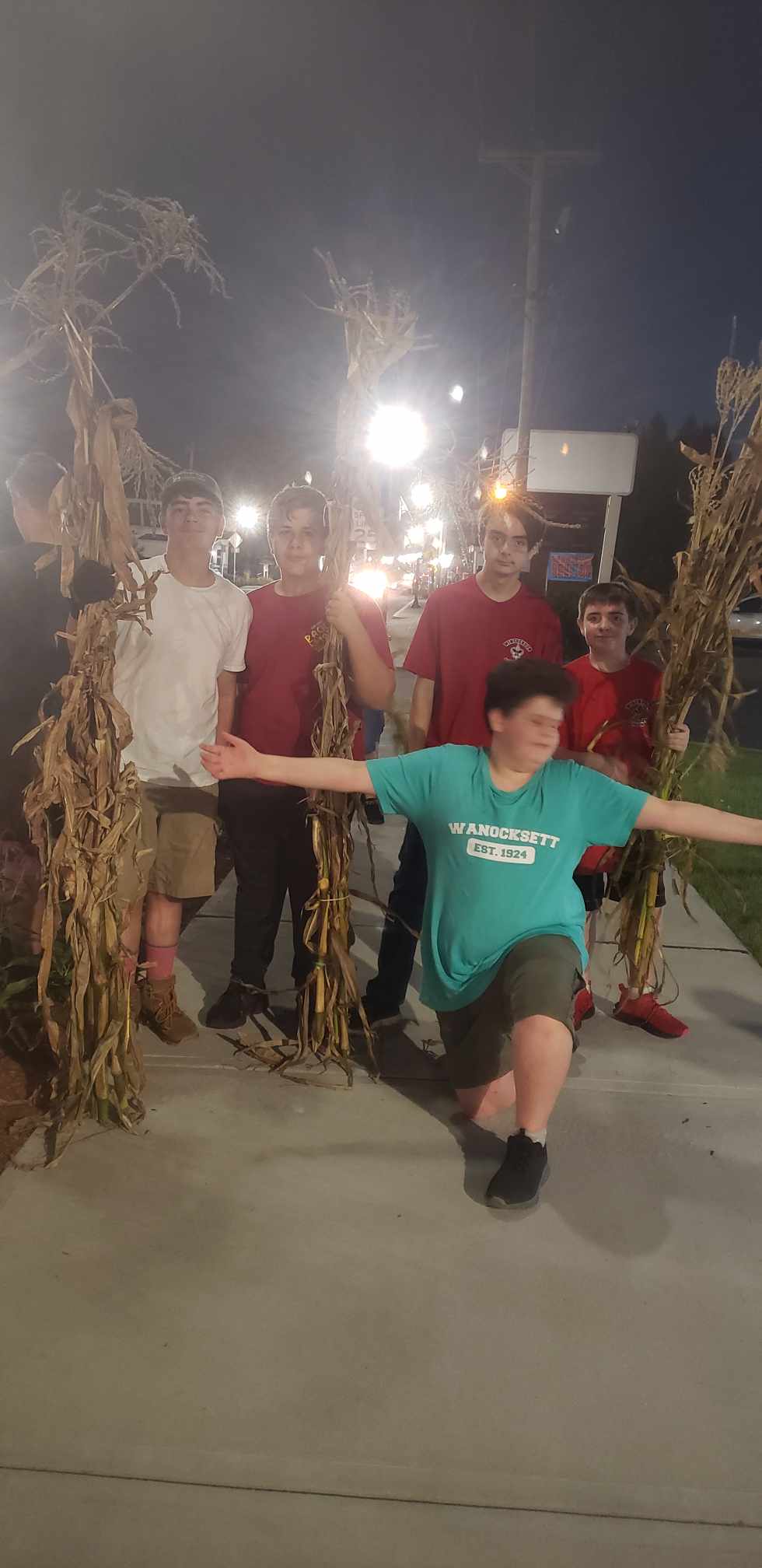 decorating Central Street with corn stalks