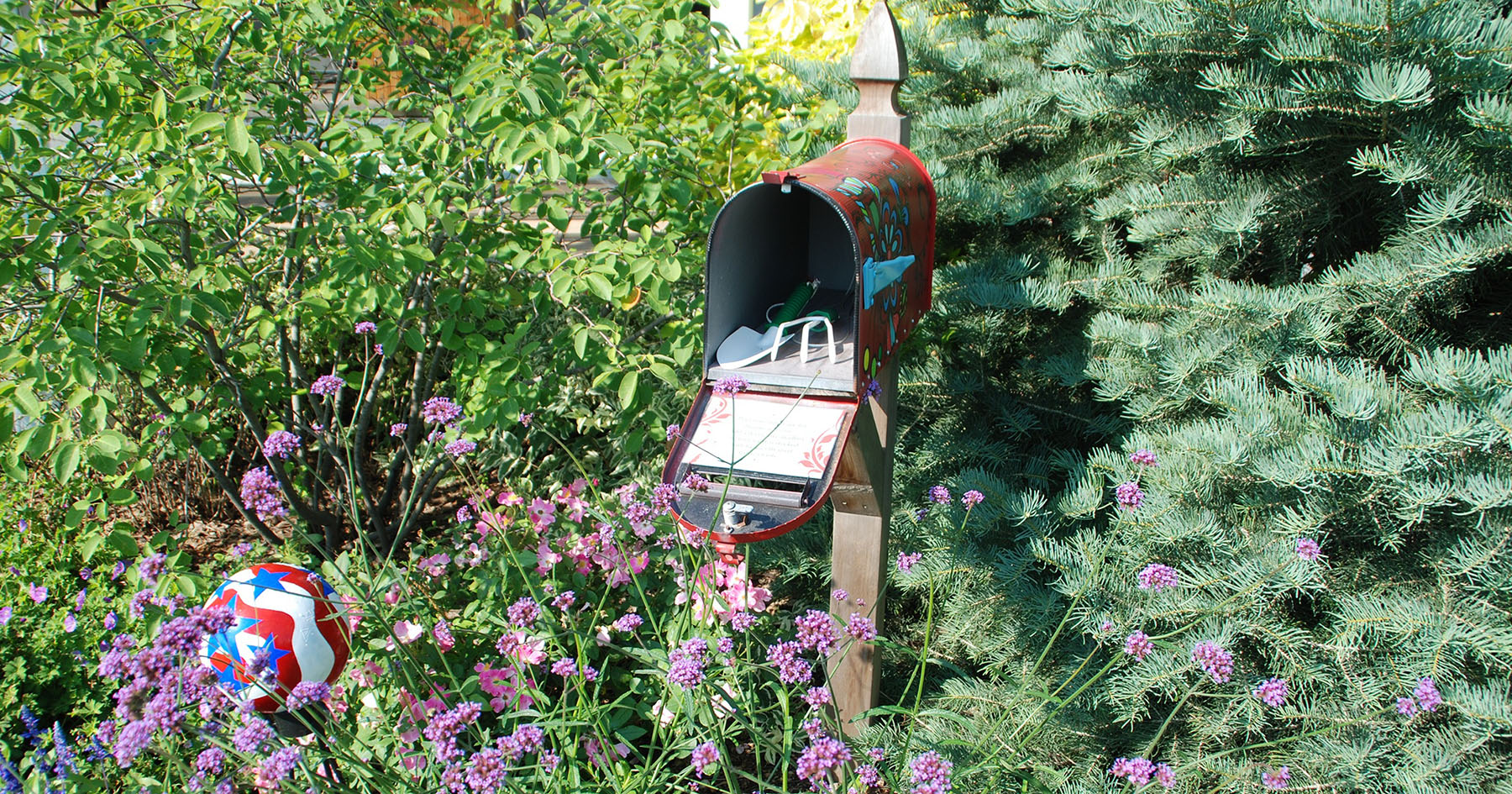 garden tools in a mailbox