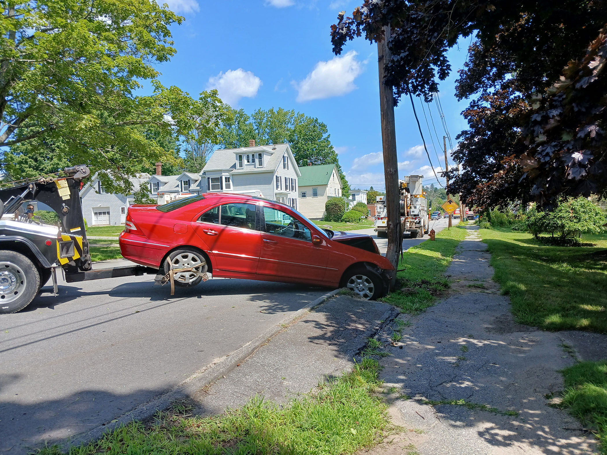 car hits pole on Pleasant Street