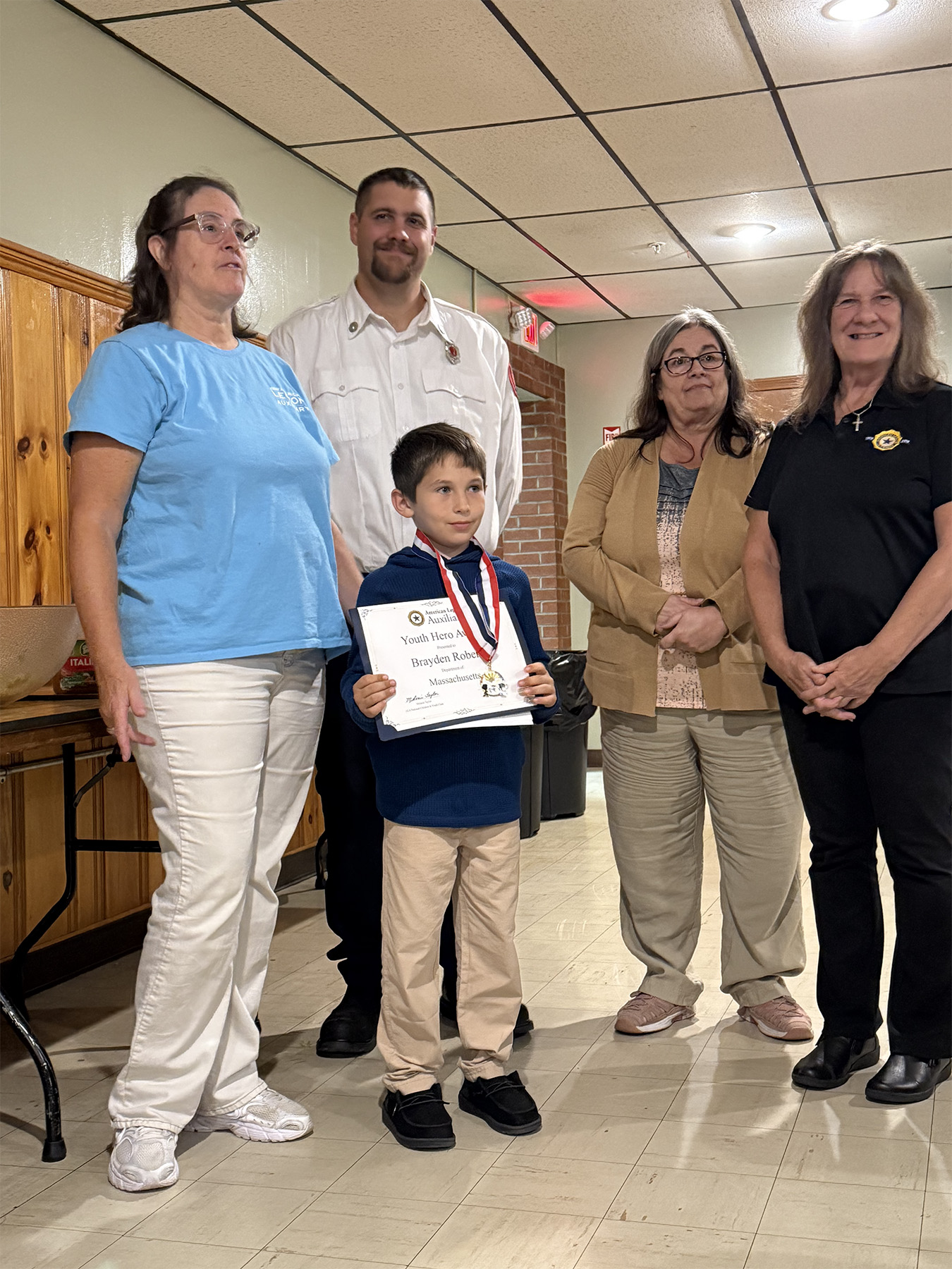 Young hero gets award from Legion